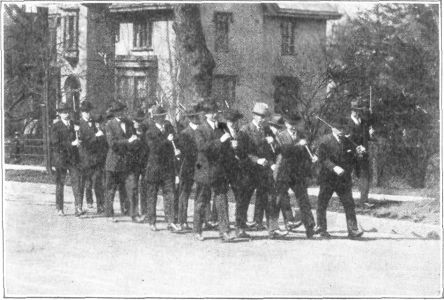 PRACTISING AND MARCHING WITH IRON BARS WEIGHING NINE POUNDS EACH