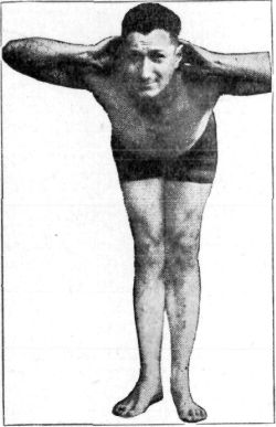 FIG. 6.—GRASP  In the "Grasp" position it is not necessary to go to extremes on the backward movement; only so far as is really comfortable. In the forward movement the body should come down practically at right angles to the hips, but the head should not be allowed to drop forward. The head should be kept up, with the elbows back and the eyes looking to the front.