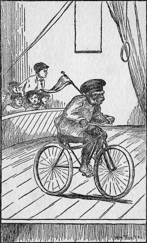 He rode around a little wooden platform on the bicycle, holding a flag over his shoulder. (Page 99)