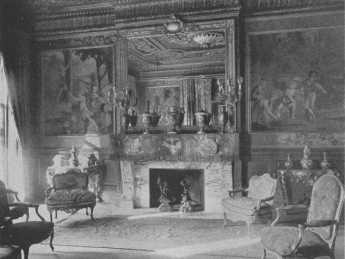 The rare console tables and chairs and the Gobelin tapestry, "Games of Children," show to great advantage in this beautifully proportioned room of soft dull gold. The side-and centre-lights, reflected in the mirror, light the room correctly