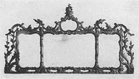 An elaborately carved and gilded Chippendale mantel  mirror, showing French influence.