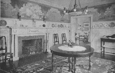 There are few treatments for walls in a Colonial dining-room that can compare with paneled walls, or wainscoting with a decorative paper above. The subject, however, must be in keeping. This paper is extremely inappropriate, and the center light is also badly chosen and could be eliminated.