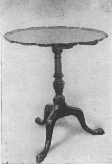 This Chippendale pie crust tip table shows the tripod base with claw feet and the carved edge which gives it its name, and which was carved down to the level, never applied. A genuine antique pie crust table is very valuable.