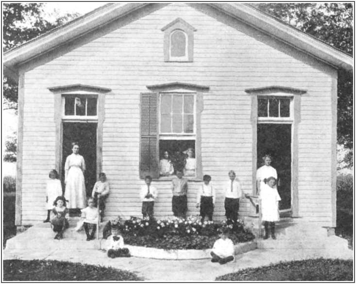 Rural school with flower bed