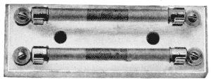 Illustration: Fig. 219. Pair of Enclosed Fuses