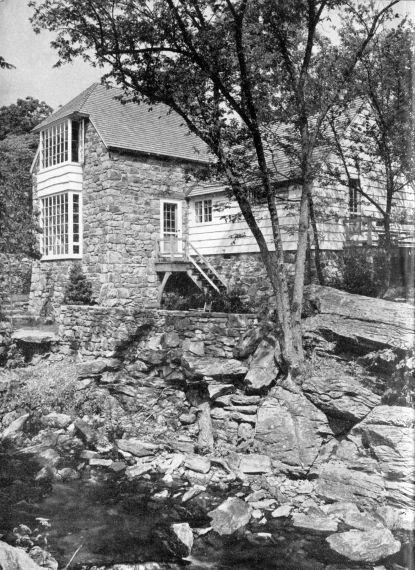 A RIVERSIDE HOME RECONSTRUCTED FROM THE RUINS OF AN OLD MILL Photo by Samuel H. Gottscho. Robertson Ward, architect