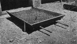 FOR DRYING SMALL QUANTITIES. A simple tray-barrow, which can be run under the house when rain comes on.