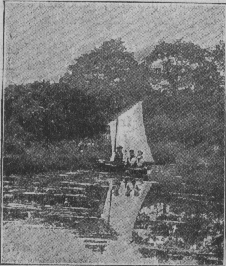 Sailing on a canal.