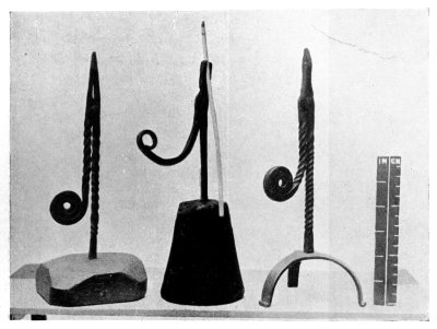 FIG. 14.—THREE RUSHLIGHT HOLDERS.  (In the National Museum of Wales, Cardiff.)