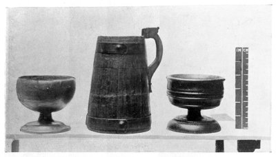 FIG. 21.—TWO WOODEN CUPS.  FIG. 22.—WOODEN FLAGON, WITH COPPER BANDS.  (In the National Museum of Wales.)