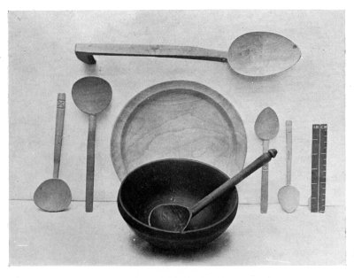 FIG. 53.—WOODEN PLATTER, BOWL, AND SPOONS.  (In the National Museum of Wales.)