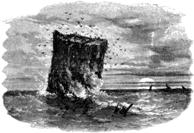 A sack shaped rock, waves breaking at its base