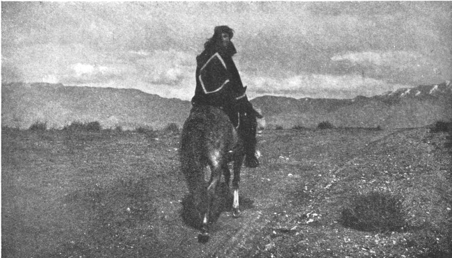 It isn't America at all! It's Arabia, and the Bedouins of the Painted Desert are Navajo boys