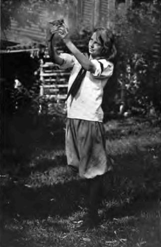 The Country Girl and Her Pets. "The quietness of the country permits a greater spiritual and mental growth, with its abundance of life, plant and animal, which challenges the mind to discover its secrets."