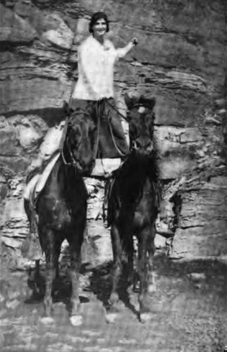 This photograph of a Camp Fire Girl shows the opportunity country life affords for good sport.