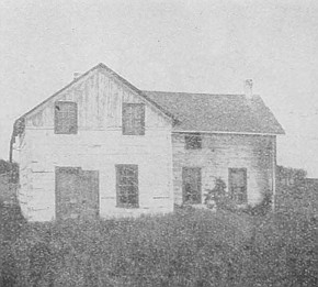 Beginning a home in the prairie—house and table "lands" are built on cement foundation.