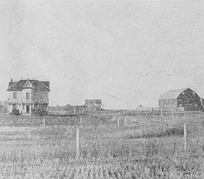 Beginning a home in the prairie—house and table "lands" are built on cement foundation.