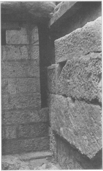 Figure 11  The interior N.W. corner of the Erechtheum. Modern masonry under N. end of W. wall