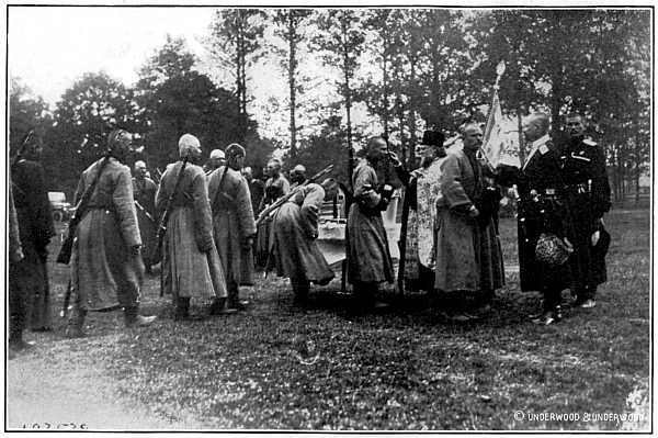 PERSONAL BLESSING BY A PRIEST IS CONSIDERED A GREATER HONOR BY A RUSSIAN SOLDIER THAN A WAR DECORATION