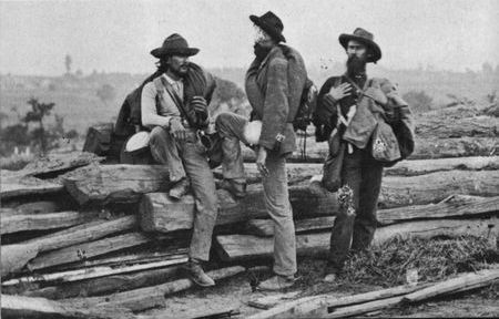 On the silent battlefield at Gettysburg, veterans of Lee's Army of Northern Virginia who survived the baptism by fire await their fate as prisoners of war.