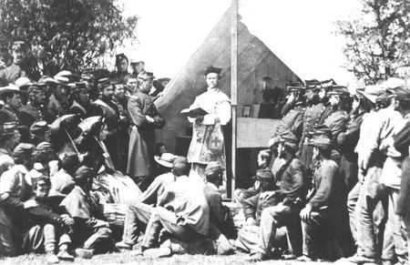 A forerunner of Father Francis Patrick Duffy, heroic Chaplain of the famous 69th New York Regiment in World War I, says Mass for the Shamrock Regiment of the 1860's. Most Civil War regiments had a chaplain.