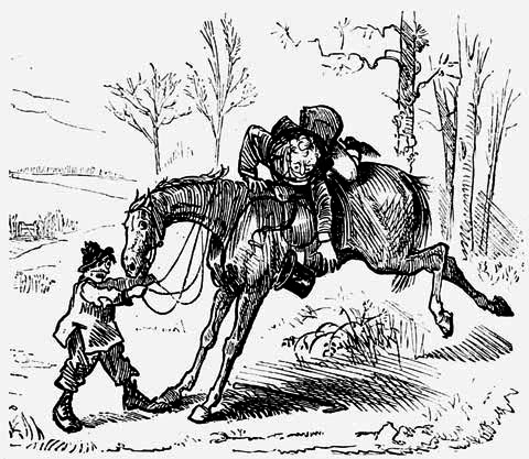 A person on a bucking horse, with someone holding the horse's reins.