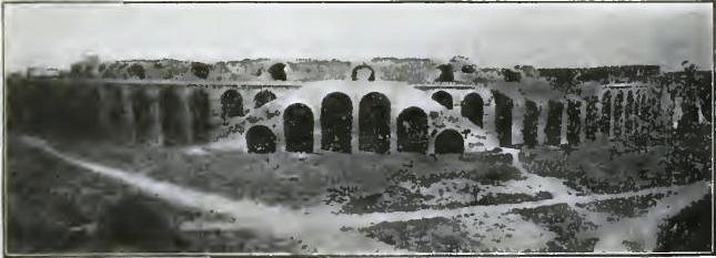 FIGURE 157. EXTERIOR OF AMPHITHEATER AT POMPEII