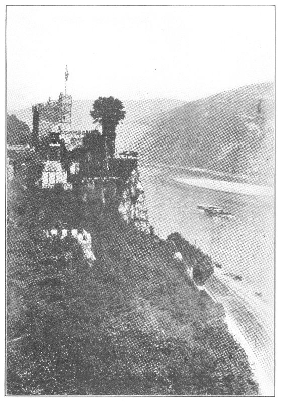 RHEINSTEIN CASTLE PERCHED HIGH ON THE WOODED BANKS OF THE RHINE