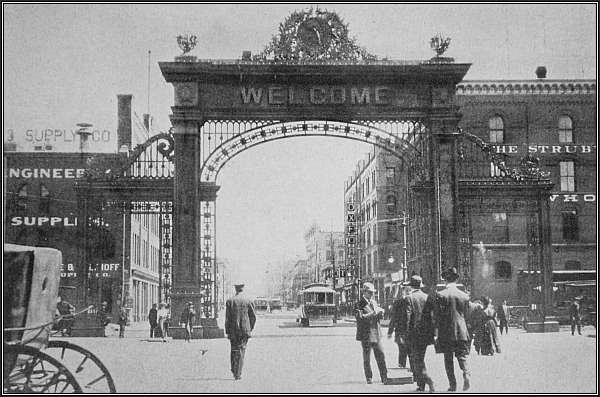 A broad arch spans Seventeenth Street and bids you welcome to Denver