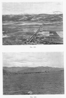 Fig. 121—Looking north from the hill near Anta in the Anta basin north of Cuzco. Typical composition of slopes and intermont basins in the Central Andes. Alluvial fill in the foreground; mature slopes in the background; in the extreme background the snow-capped crests of the Cordillera Vilcapampa.