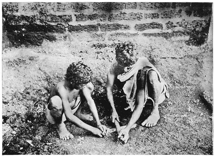 Paniyans making fire.