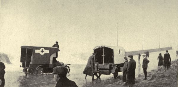 AMBULANCES HELD UP BY THE HIGH TIDE