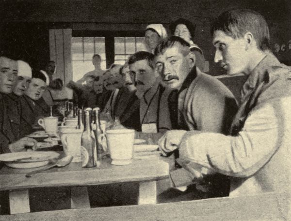 THE BUSY DINNER-HOUR IN A HUT