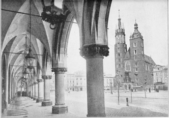 THE MARKET SQUARE IN CRACOW  Here Poland mourns her glorious past, and the returned immigrant assures her of a glorious future.