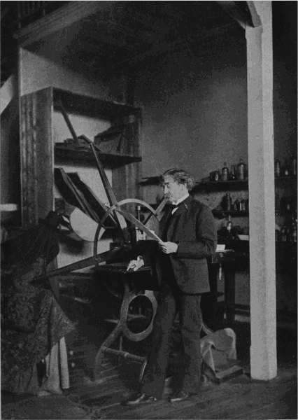 WHISTLER AT HIS PRINTING PRESS IN THE STUDIO, RUE NOTRE-DAME-DES-CHAMPS