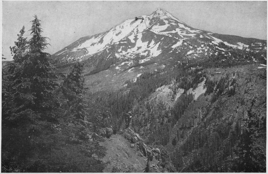 Looking Across Hunt’s Cove to Jefferson. Dotted Line Shows Route of Climb. Arrow Points to Place Where Dumplin’ Slipped.