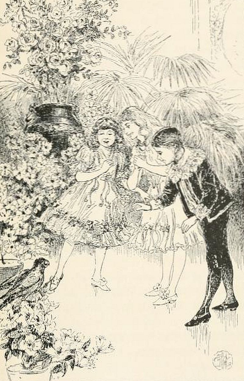 Two young girls, dressed in frilly dresses with ribbons and lace, stand close together, smiling and interacting with a young boy. The boy, dressed in a formal outfit with a jacket featuring decorative trim, appears to be offering something to the girls.