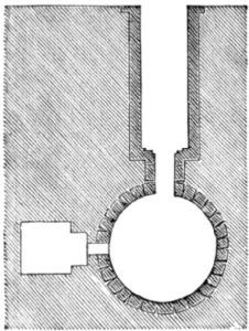 Showing entrance leading to round chamber with a side chamber