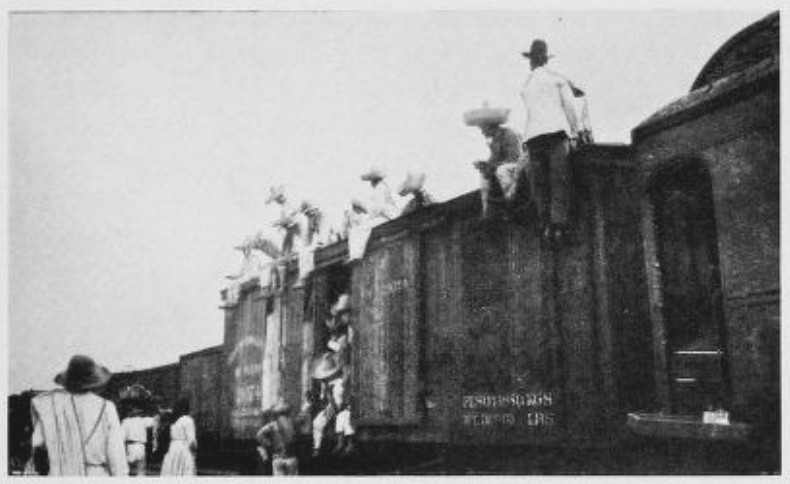 AN ESCORT OF SOLDIERS OCCUPIED A FREIGHT CAR AHEAD AS A
PRECAUTION AGAINST BANDITS